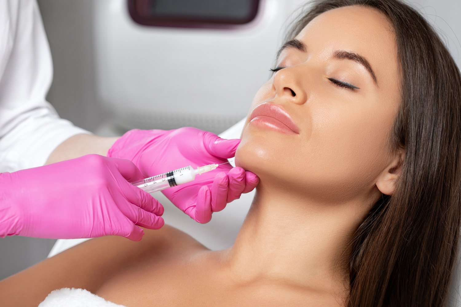 Woman Receiving Injection on Her Chin